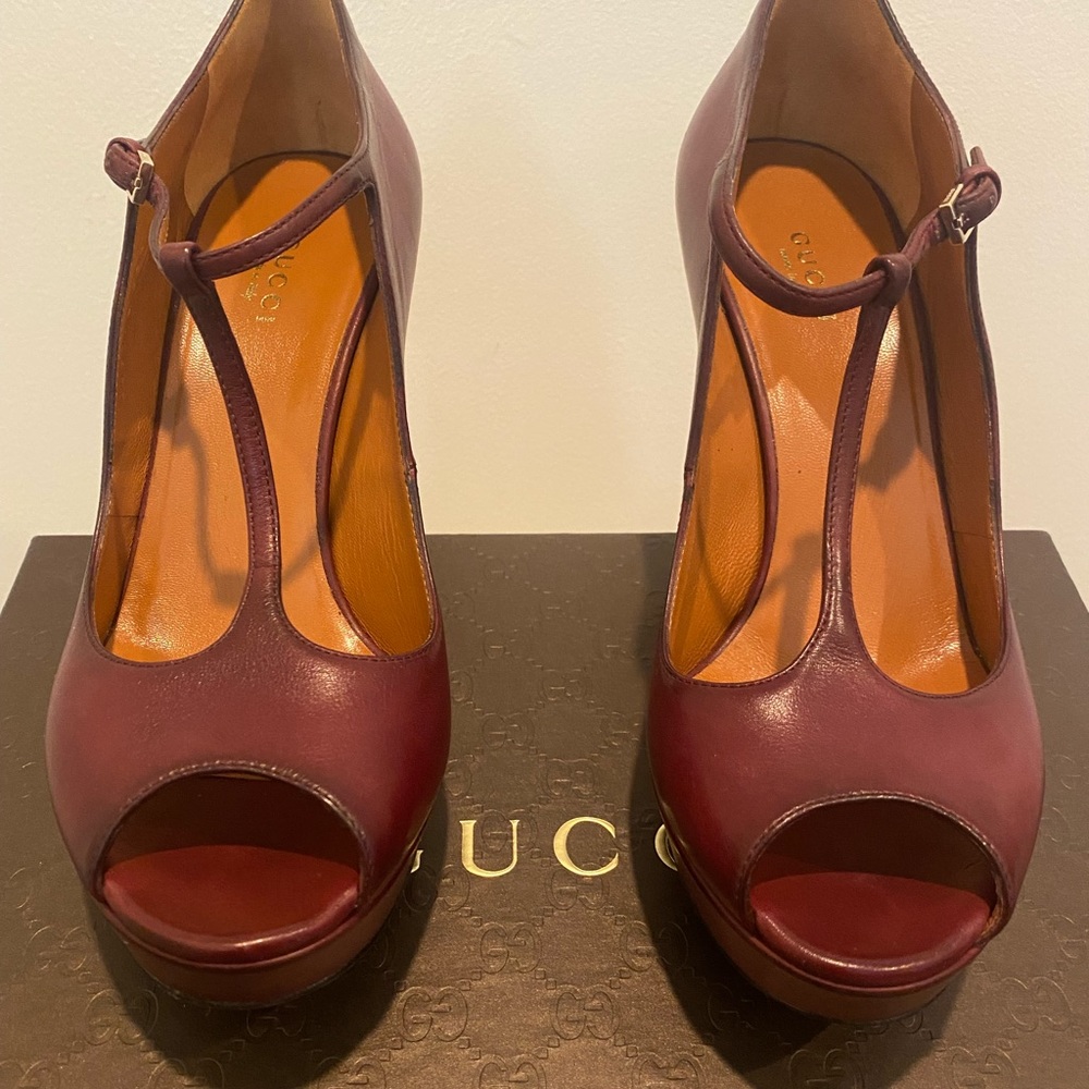 Gucci shoes (used) the color on label says Red but  are a burgandy red family